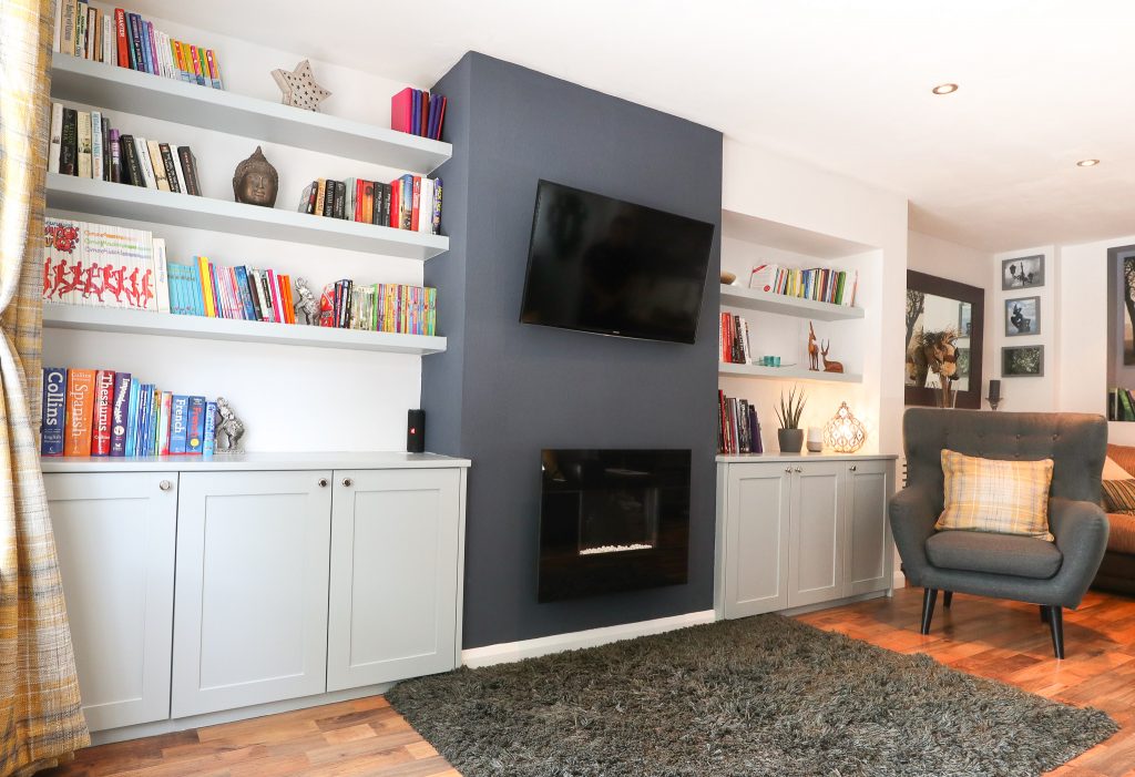 floating alcove shelves above built in alcove cupboards