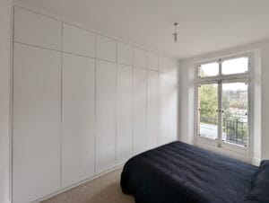 bedroom fitted wardrobes across the wall modern style
