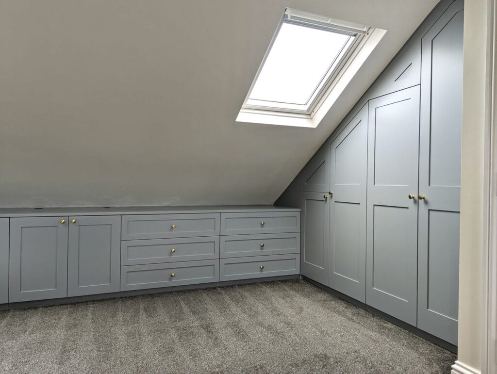 Built in loft wardrobes, drawers and cabinets