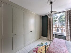 custom traditional wardrobes in a bedroom in London